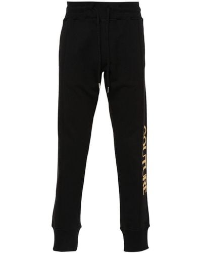 Versace Pantalones de chándal con logo - Negro