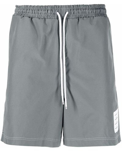 Thom Browne Pantalones cortos de chándal con cordones - Gris
