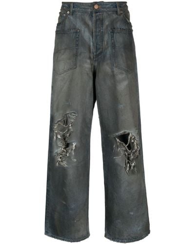 Balenciaga Jeans a gamba ampia con effetto vissuto - Grigio