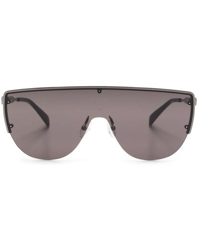 Alexander McQueen Sonnenbrille mit Totenkopf-Nieten - Grau