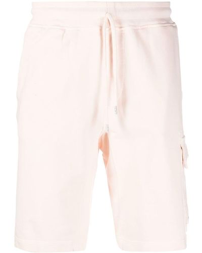 C.P. Company Pantalones cortos de chándal con cierre de botón - Naranja