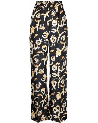 Nanushka Pantalones con cinturilla elástica y motivo floral - Negro