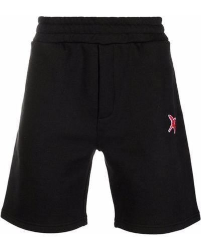Axel Arigato Pantalones cortos de chándal con parche del logo - Negro