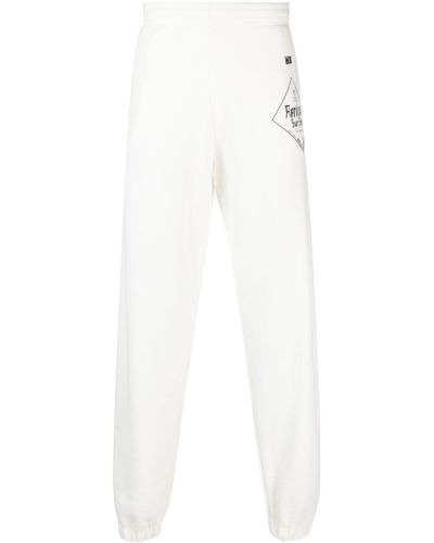 Wales Bonner Pantalones de chándal con logo estampado - Blanco