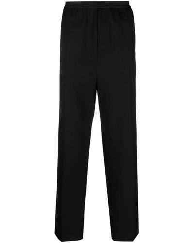 Balenciaga Pantalones de chándal con logo en la cinturilla - Negro