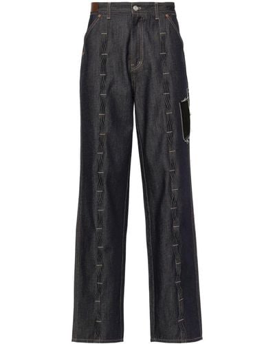 ANDERSSON BELL Patchwork-detail Wide-leg Jeans - Blue
