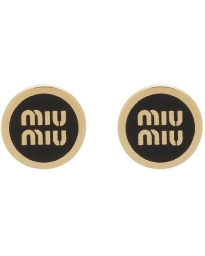 Miu Miu Pendiente con logo en relieve - Metálico