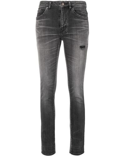 Saint Laurent Jeans skinny con effetto schiarito - Grigio