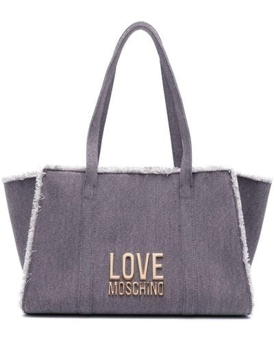 Love Moschino Denim-Schultertasche mit Logo - Lila