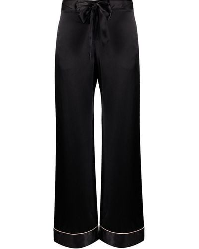 Kiki de Montparnasse Pantalon en soie à taille nouée - Noir