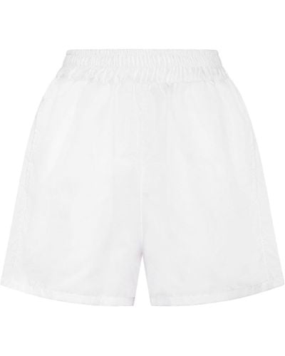 Philipp Plein Pantalones cortos de running con franjas del logo - Blanco