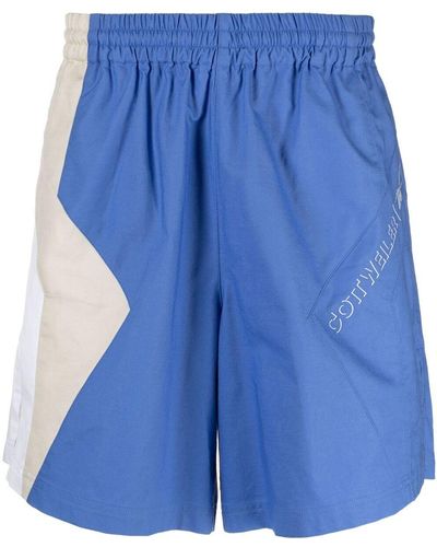 Reebok Pantalones cortos de deporte con diseño colour block - Azul