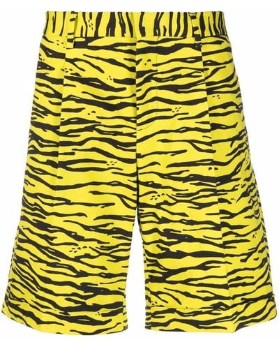 Moschino Pantalones cortos de deporte con estampado de cebra - Amarillo