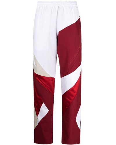 Reebok Pantalones de chándal con diseño colour block - Rojo