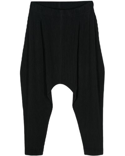 Homme Plissé Issey Miyake Bundfaltenhose mit tiefem Schritt - Schwarz