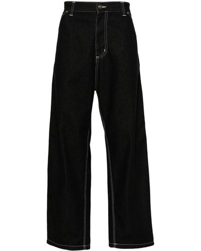 Carhartt Wide-Leg-Jeans mit Logo-Patch - Schwarz