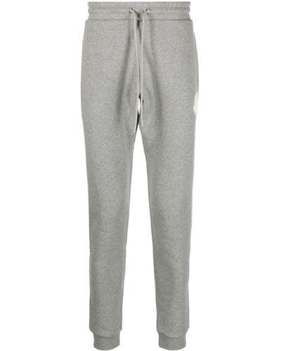 Moncler Pantaloni sportivi con applicazione logo - Grigio