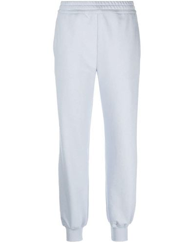 Alexander McQueen Pantalon de jogging à logo imprimé - Blanc