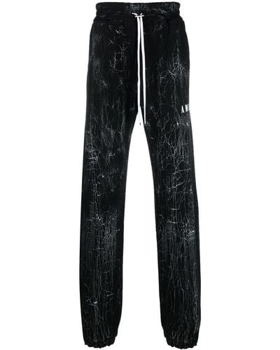 Amiri Cracked-dye Logo Track Pants - Black