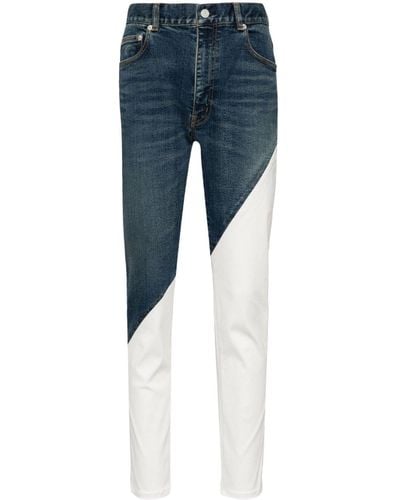 Undercover Mid-rise slim-cut jeans - Azul