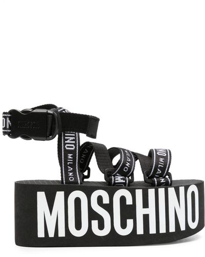 Moschino Sandales plateforme à logo imprimé - Noir