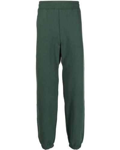 Suicoke Pantalones de chándal con logo estampado - Verde
