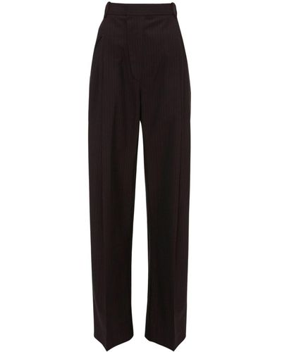 Victoria Beckham Pleated pinstripe wide-leg trousers - Schwarz