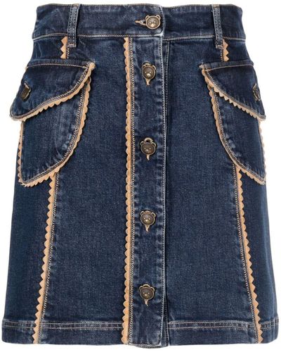 Moschino Minijupe en jean à bords festonnés - Bleu