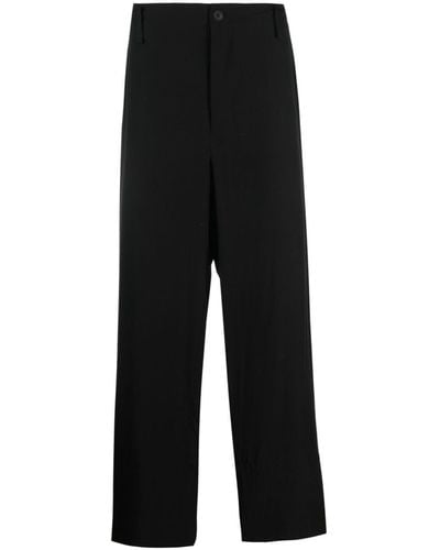 Yohji Yamamoto Pantalones ajustados con tiro caído - Negro
