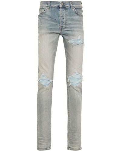 Amiri MX1 Suede Skinny-Jeans - Blau