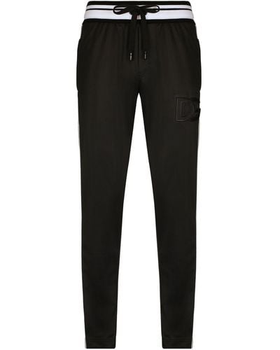 Dolce & Gabbana Pantalon de jogging à bande logo - Noir