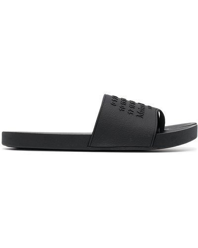 Maison Margiela Sandalias Tabi con logo en relieve - Negro