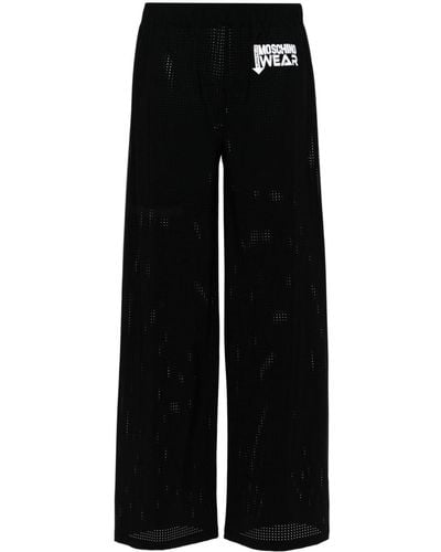 Moschino Pantalones anchos con logo - Negro