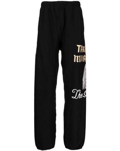 TAKAHIROMIYASHITA TheSoloist. Pantalones de chándal con logo lateral - Negro