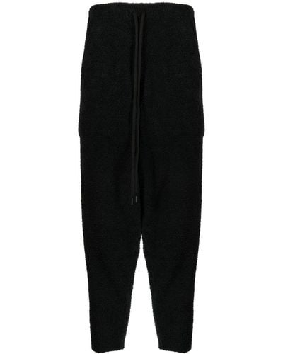 MASTERMIND WORLD Pantalones de chándal con logo estampado - Negro