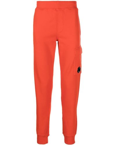 C.P. Company Pantalon de jogging à détail de lentille signature - Rouge