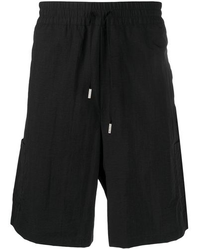 Heron Preston Pantalones cortos de deporte con parche del logo - Negro