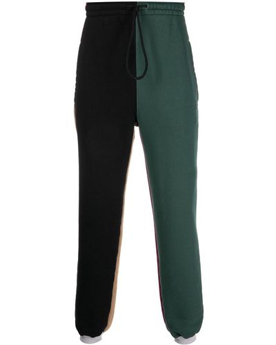Alexander Wang Pantalones de chándal con paneles colour block - Verde