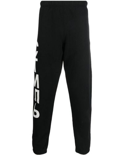 Heron Preston Pantalones de chándal con motivo gráfico - Negro