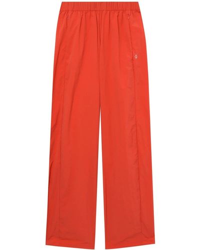 Izzue Pantalones de chándal con logo bordado - Rojo
