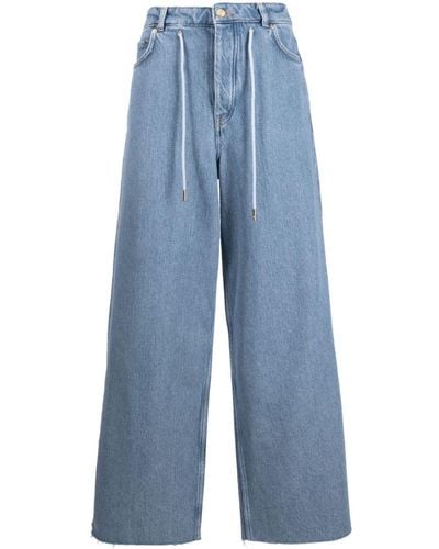 Ganni Weite Jeans mit Kordelzug - Blau