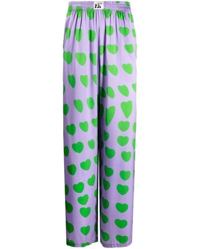 Natasha Zinko Heart-print Flared-trousers - Green