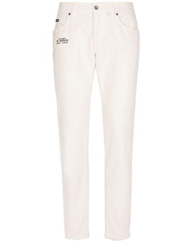 Dolce & Gabbana Jean skinny à logo appliqué - Blanc