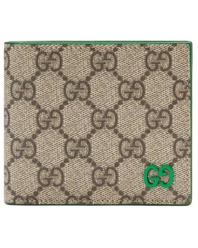 Gucci Portefeuille monogrammé à plaque logo - Gris