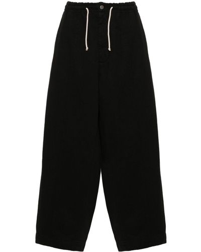 Societe Anonyme Logo-embroidered Tapered Trousers - Black