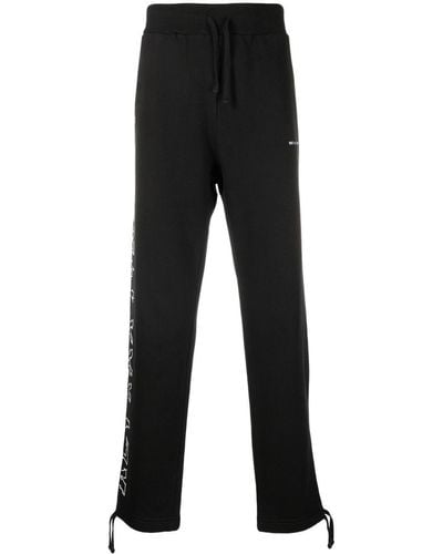1017 ALYX 9SM Pantalon de jogging en coton à logo imprimé - Noir