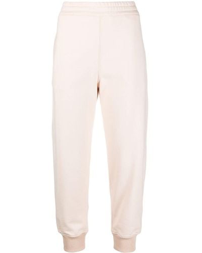Alexander McQueen Pantalones de chándal con logo bordado - Rosa
