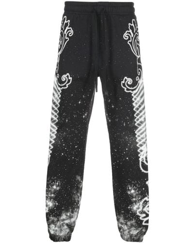 Versace Jeans Couture Pantalones de chándal con motivo de galaxia - Negro