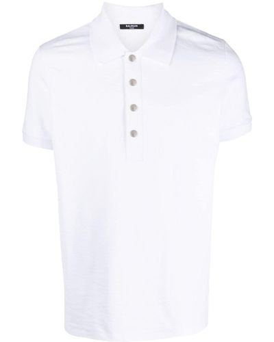 Balmain Polo à motif monogrammé embossé - Blanc