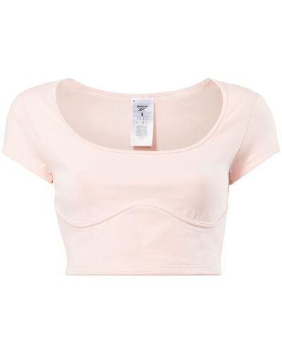 Reebok T-shirt en jersey à coupe crop - Rose